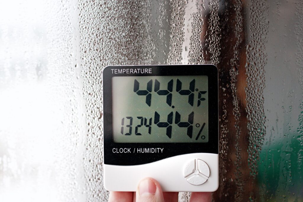 Humidity indicator is indicated on the hygrometer of the device. An image of electronic device to check temperature and humidity in closed area